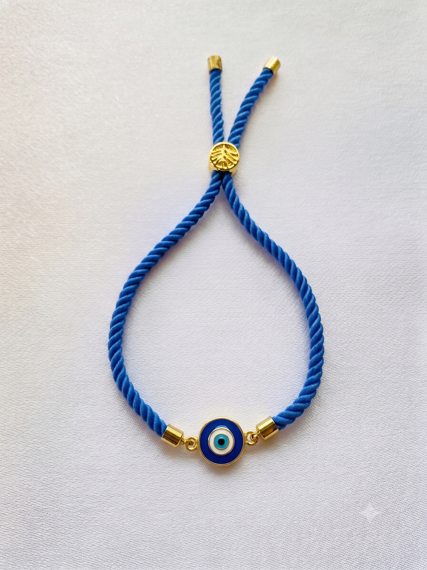 Evil Eye Rakhi Silver Thread Bracelet