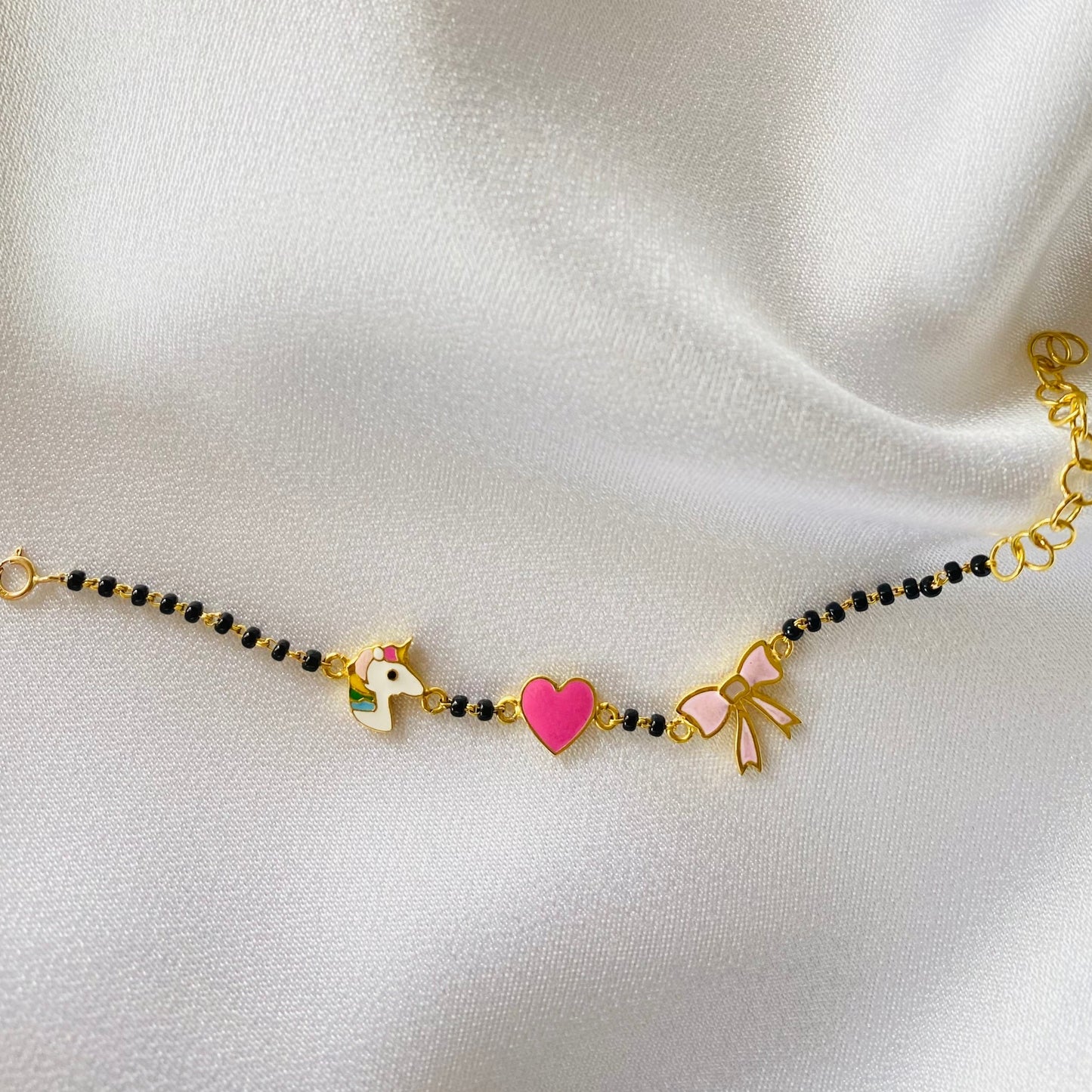 Unicorn Heart Bow Gold Nazariya