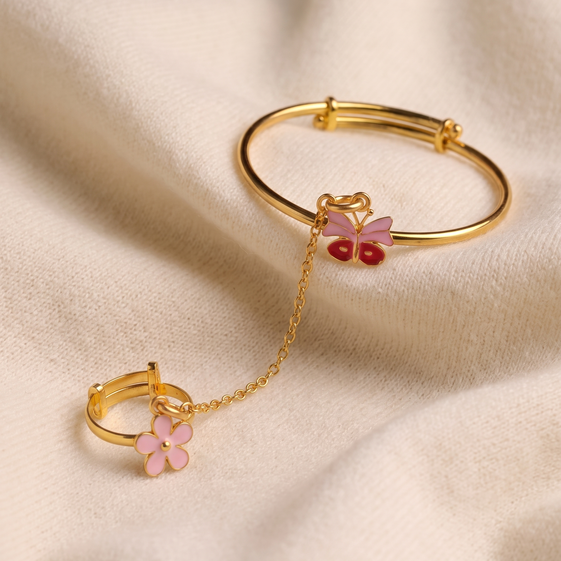 Pink Butterfly Flower Silver Hathphool for baby girls featuring a butterfly, flower, pink heart ring, and evil eye charm, handcrafted in 925 sterling silver with premium gold plating.