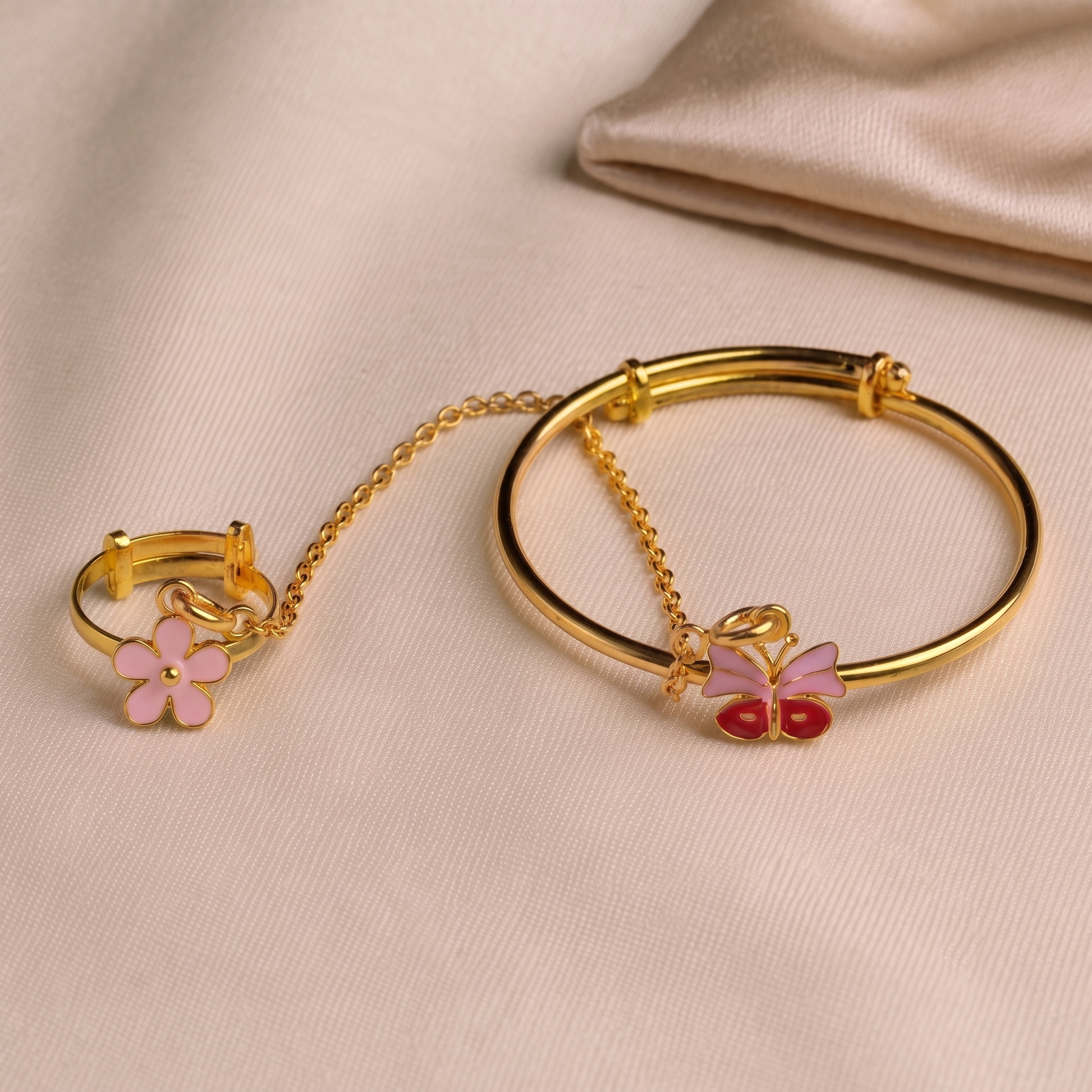 Pink Butterfly Flower Silver Hathphool for baby girls featuring a butterfly, flower, pink heart ring, and evil eye charm, handcrafted in 925 sterling silver with premium gold plating.